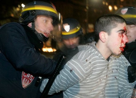  police officer arrests a demonstrator 